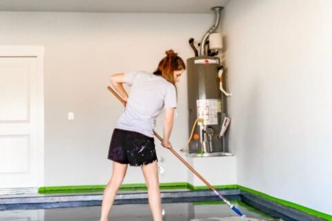 Woman attempts DIY garage coating